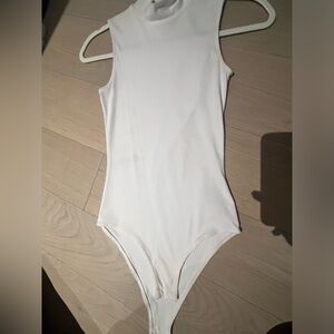 White bodysuit with mock neck